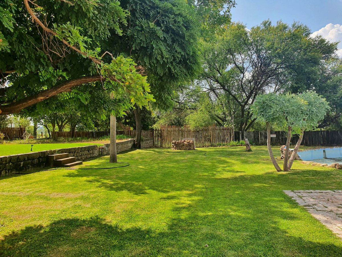 Shady lawns and trees at the lodge