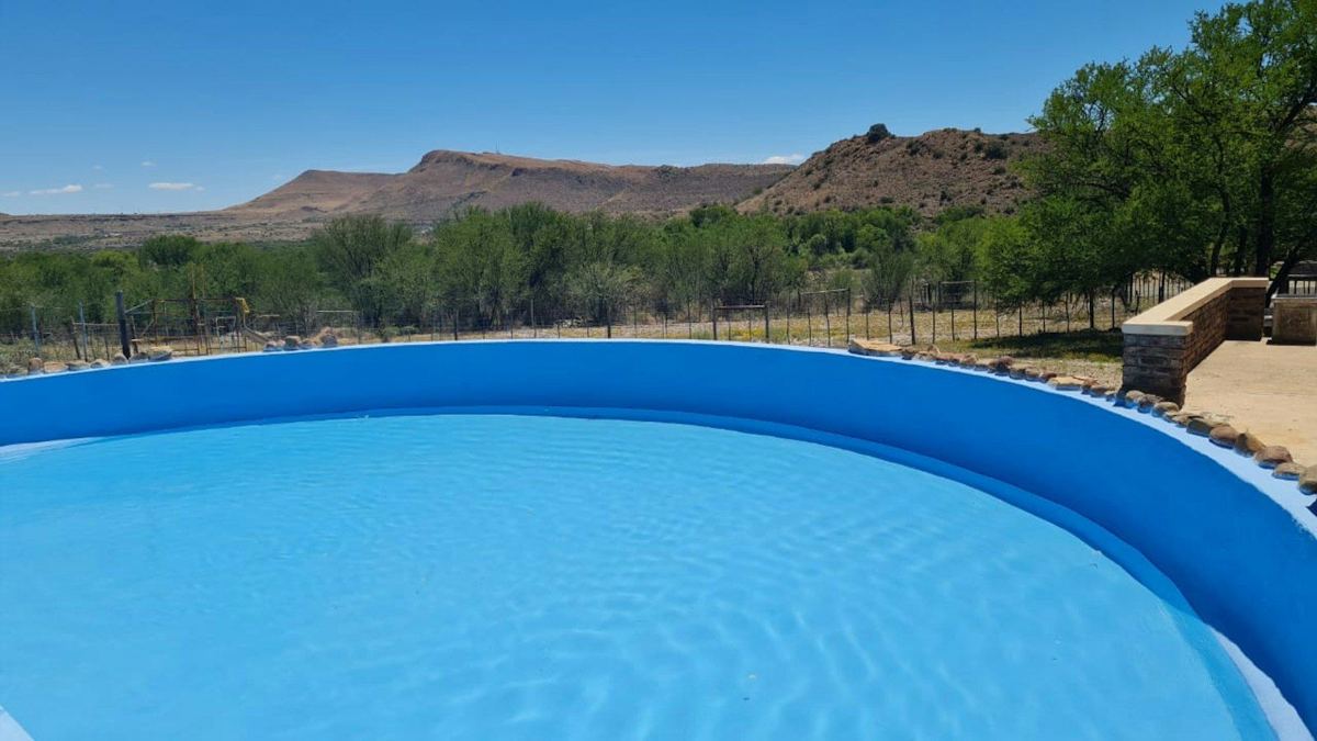 Swimming pool with Karoo mountains behind